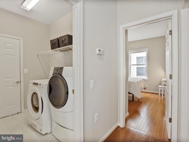 29 Norwood Ln, Fredericksburg, VA 22406 - laundry room with baseboards, laundry area, hardwood / wood-style floors, and washer and dryer
