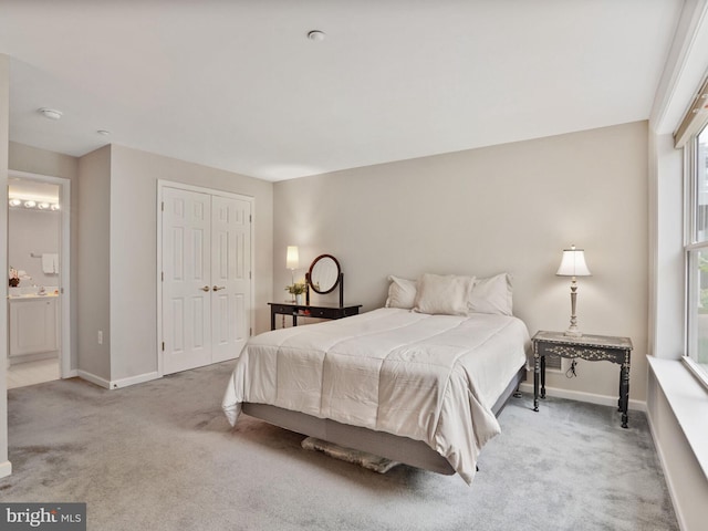 29 Norwood Ln, Fredericksburg, VA 22406 - carpeted bedroom with baseboards, ensuite bathroom, and a closet