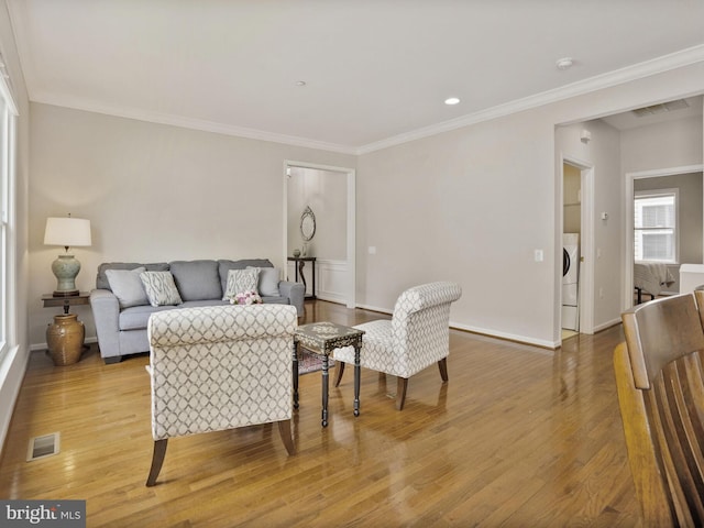 29 Norwood Ln, Fredericksburg, VA 22406 - living area with visible vents, ornamental molding, baseboards, and wood finished floors