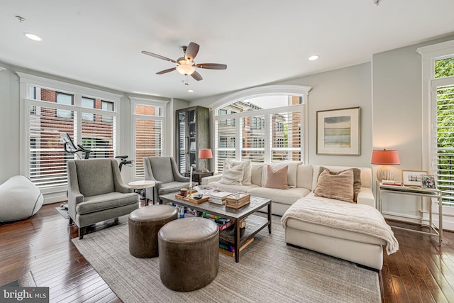 living room featuring ceiling fan, wood-type flooring, and recessed lighting