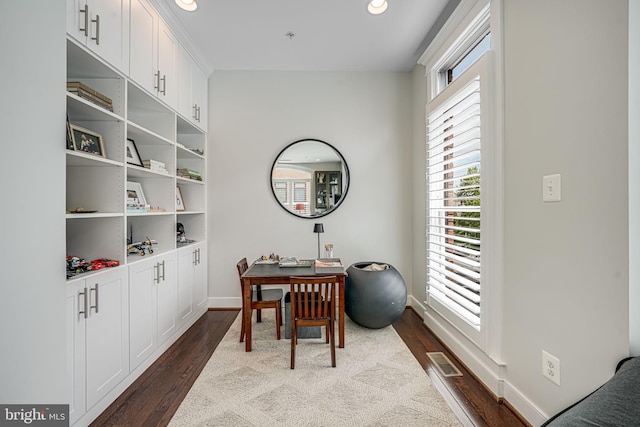 office space with dark wood-style flooring, recessed lighting, and baseboards