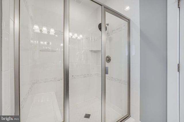 full bathroom featuring a stall shower