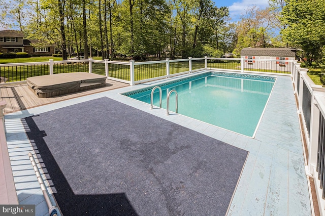 1246 Center St, Levittown, PA 19057 - view of pool featuring a fenced in pool, fence, a wooden deck, and an outdoor structure
