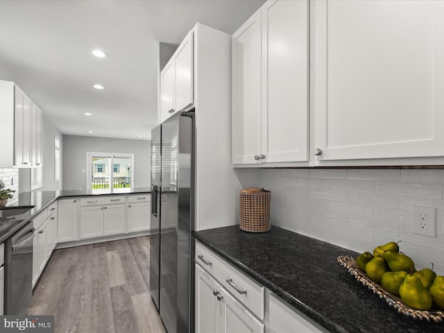 36986 Blue Teal Rd, Selbyville, DE 19975 - kitchen with white cabinetry, a sink, appliances with stainless steel finishes, and light wood-style flooring