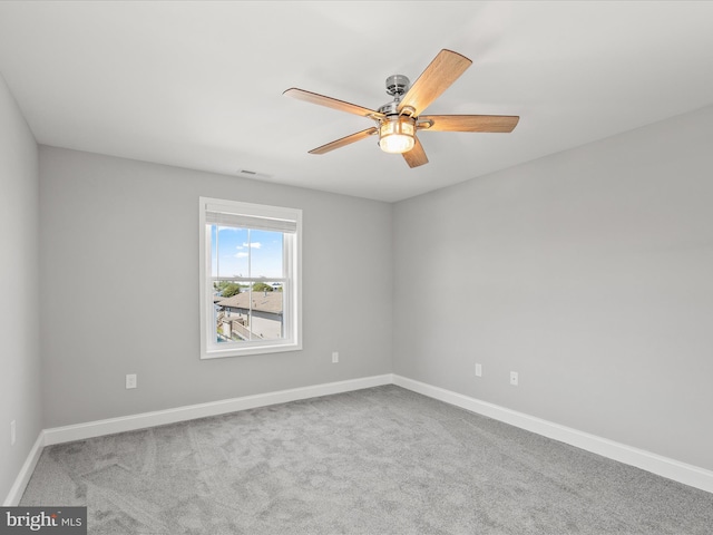 36986 Blue Teal Rd, Selbyville, DE 19975 - unfurnished room with baseboards, carpet, ceiling fan, and visible vents