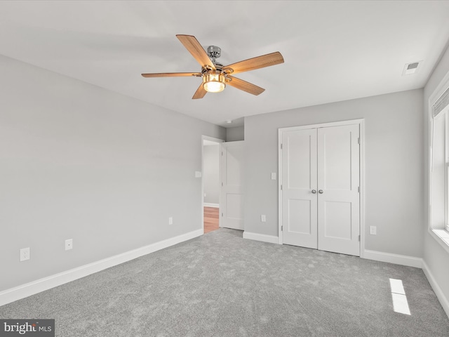36986 Blue Teal Rd, Selbyville, DE 19975 - unfurnished bedroom featuring a closet, baseboards, carpet flooring, and visible vents
