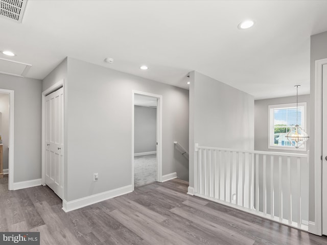 36986 Blue Teal Rd, Selbyville, DE 19975 - empty room with baseboards, recessed lighting, wood finished floors, and visible vents