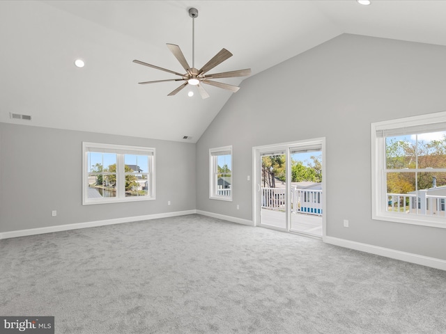 36986 Blue Teal Rd, Selbyville, DE 19975 - carpeted empty room with high vaulted ceiling, plenty of natural light, a ceiling fan, and visible vents