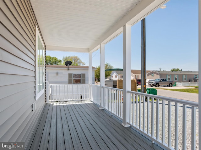 36986 Blue Teal Rd, Selbyville, DE 19975 - wooden deck with a residential view and a porch