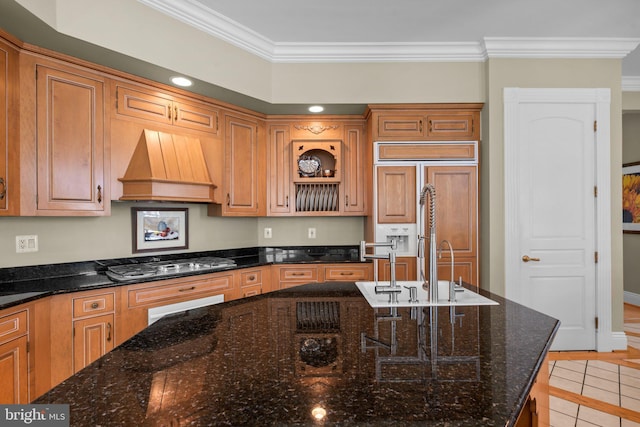 285 Eagle Hill Rd, Pasadena, MD 21122 - kitchen featuring crown molding, stainless steel gas cooktop, light tile patterned floors, and premium range hood