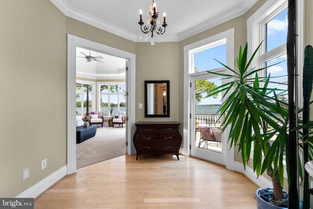 285 Eagle Hill Rd, Pasadena, MD 21122 - interior space featuring crown molding, a water view, baseboards, and light wood-style floors