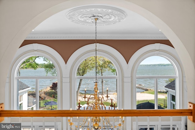 285 Eagle Hill Rd, Pasadena, MD 21122 - details featuring a water view, ornamental molding, arched walkways, and a notable chandelier