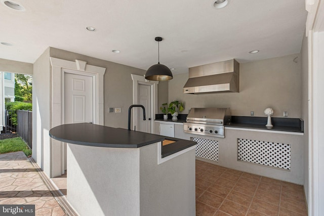 285 Eagle Hill Rd, Pasadena, MD 21122 - kitchen featuring a kitchen island with sink, dark countertops, recessed lighting, wall chimney exhaust hood, and hanging light fixtures