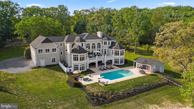 285 Eagle Hill Rd, Pasadena, MD 21122 - back of house with a fenced backyard, a patio area, a yard, and a chimney