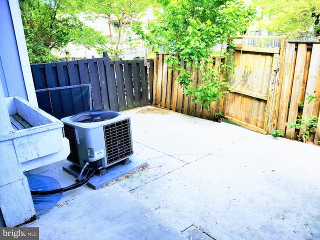 18478 Stone Holw, Germantown, MD 20874 - view of patio / terrace featuring a fenced backyard and cooling unit