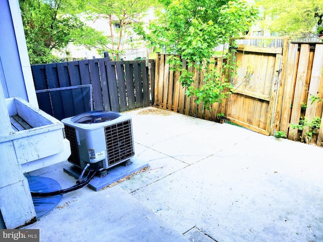 18478 Stone Holw, Germantown, MD 20874 - view of patio / terrace featuring cooling unit and a fenced backyard