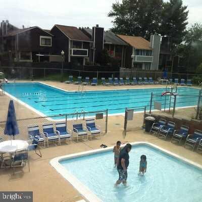 18478 Stone Holw, Germantown, MD 20874 - community pool with fence and a patio