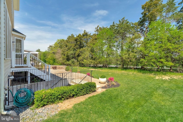 view of yard featuring stairway