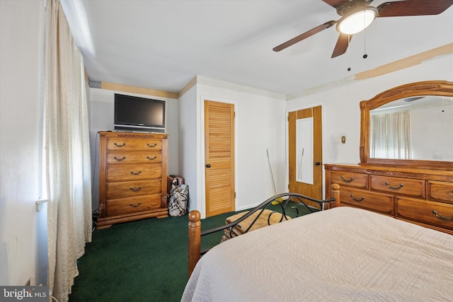 carpeted bedroom with a ceiling fan