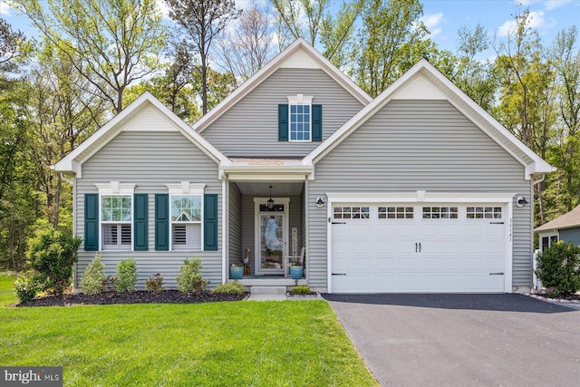 view of front of house featuring a front lawn and driveway