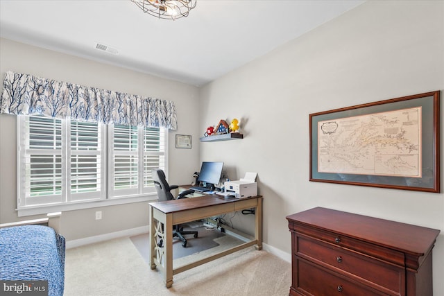 office with carpet, visible vents, and baseboards