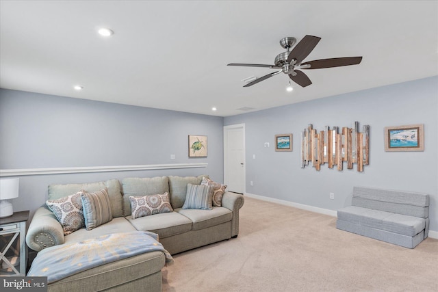 living room featuring ceiling fan, carpet, baseboards, and recessed lighting