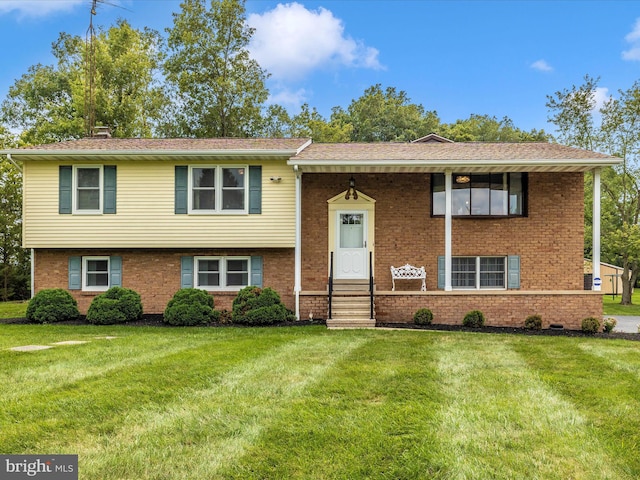 11615 Taneytown Pike, Emmitsburg, MD 21727 - bi-level home featuring a front lawn and brick siding