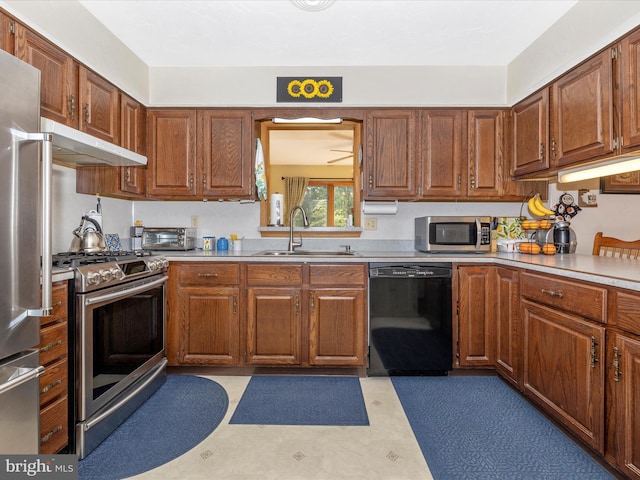11615 Taneytown Pike, Emmitsburg, MD 21727 - kitchen featuring a sink, light countertops, stainless steel appliances, and under cabinet range hood