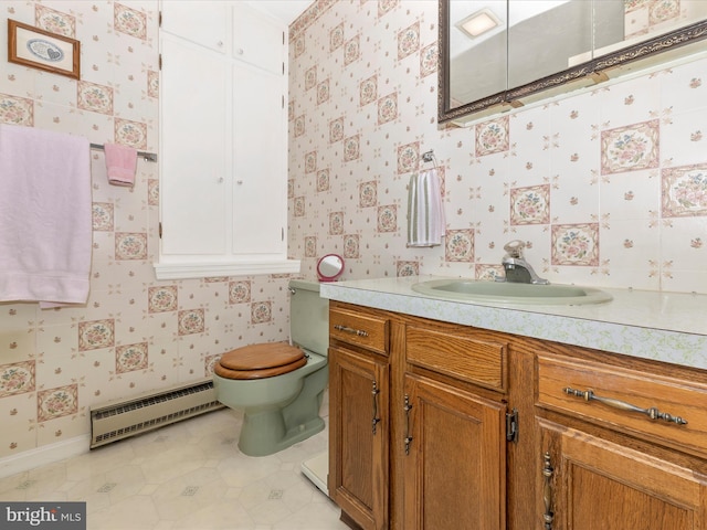 11615 Taneytown Pike, Emmitsburg, MD 21727 - bathroom featuring tile patterned flooring, vanity, toilet, wallpapered walls, and a baseboard radiator