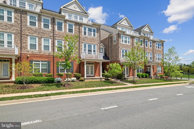 42621 Capitol View Ter, Broadlands, VA 20148 - townhome / multi-family property with french doors and a residential view