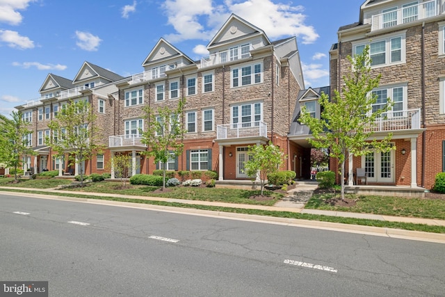 42621 Capitol View Ter, Broadlands, VA 20148 - view of property featuring brick siding and a residential view