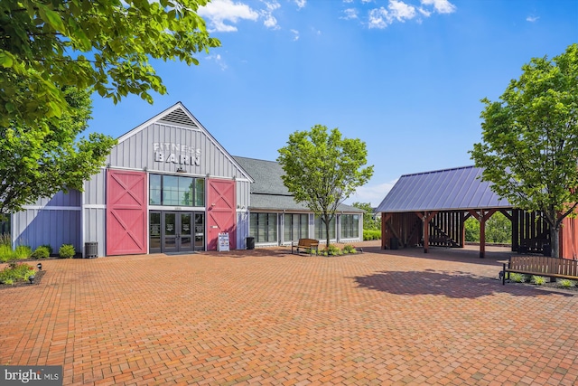 17438 Southern Shores Dr, Dumfries, VA 22026 - view of patio with an outbuilding, french doors, and a barn