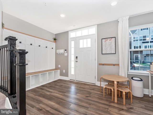 mudroom with baseboards, recessed lighting, and wood finished floors