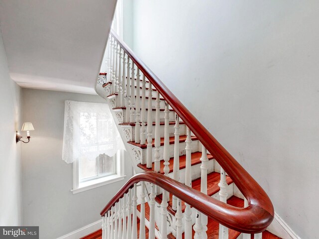 staircase with baseboards