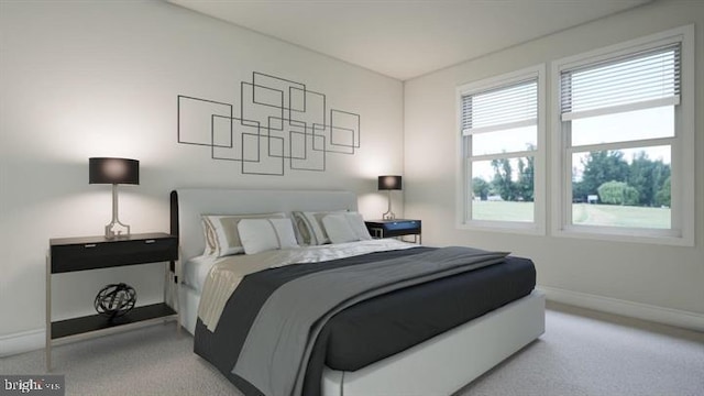 bedroom with baseboards and carpet flooring