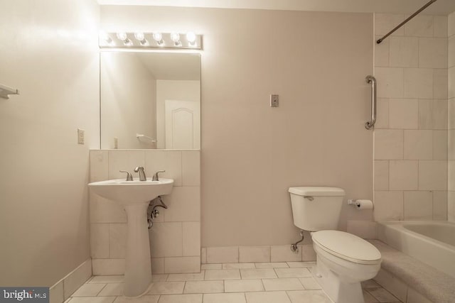 1211 S Eads St S Unit 401, Arlington, VA 22202 - bathroom with toilet, tile patterned floors,  shower combination, and a sink