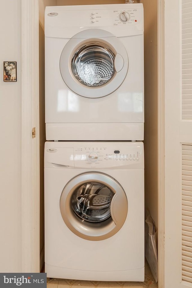 1211 S Eads St S Unit 401, Arlington, VA 22202 - clothes washing area with estacked washer and dryer