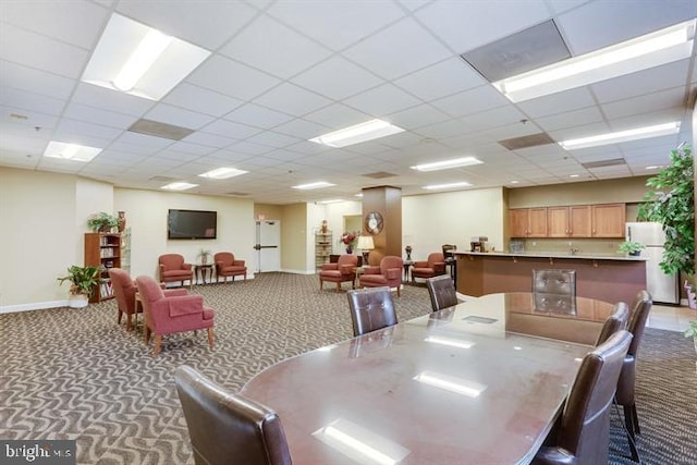 1211 S Eads St S Unit 401, Arlington, VA 22202 - dining space featuring carpet, baseboards, and a drop ceiling