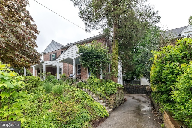 2948 Normandy Rd, Ardmore, PA 19003 - view of side of property with brick siding and covered porch
