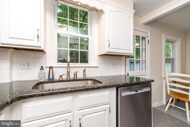 2948 Normandy Rd, Ardmore, PA 19003 - kitchen with stainless steel dishwasher, a sink, and white cabinetry