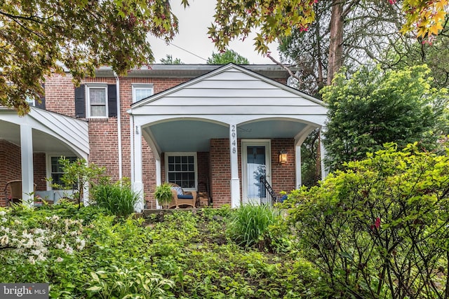 2948 Normandy Rd, Ardmore, PA 19003 - view of front of home featuring brick siding and a porch