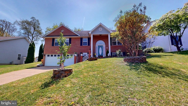 609 Quartzite Cir, Winchester, VA 22601 - split foyer home featuring brick siding, a front lawn, an attached garage, and driveway