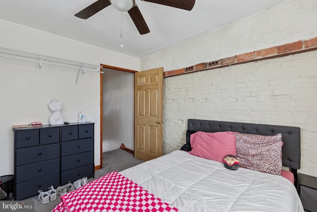 bedroom with carpet floors and a ceiling fan