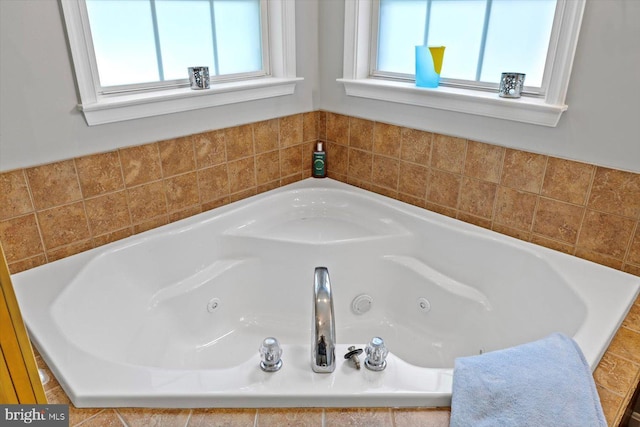 bathroom featuring a whirlpool tub