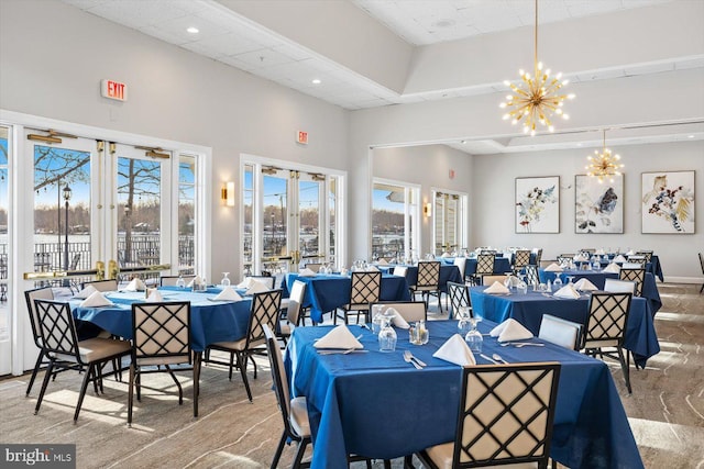 dining room with recessed lighting and a chandelier