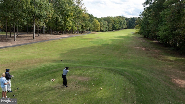 view of property's community featuring view of golf course