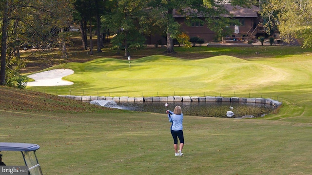 view of home's community featuring golf course view