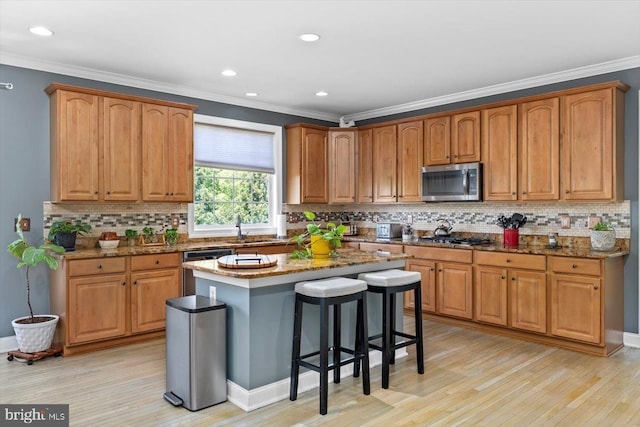 11 Garnet Way, Fredericksburg, VA 22405 - kitchen with appliances with stainless steel finishes, ornamental molding, and light wood-style floors