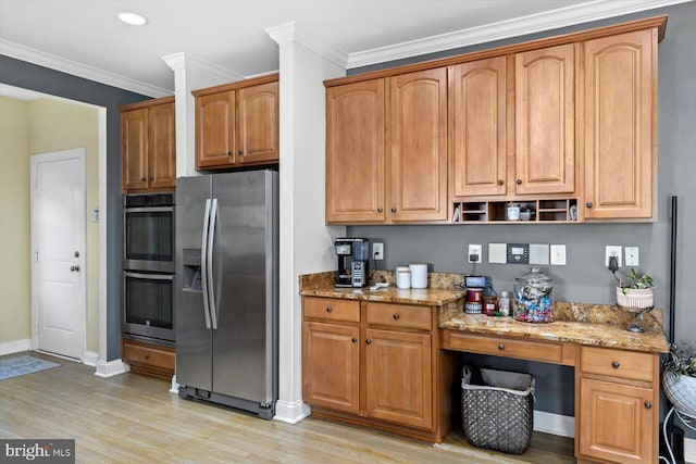 11 Garnet Way, Fredericksburg, VA 22405 - kitchen with crown molding, light stone countertops, appliances with stainless steel finishes, light wood-style floors, and baseboards