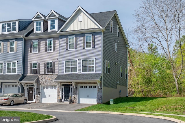 300 Rock Run Cir, Broomall, PA 19008 - multi unit property featuring stone siding, a garage, board and batten siding, a front yard, and driveway